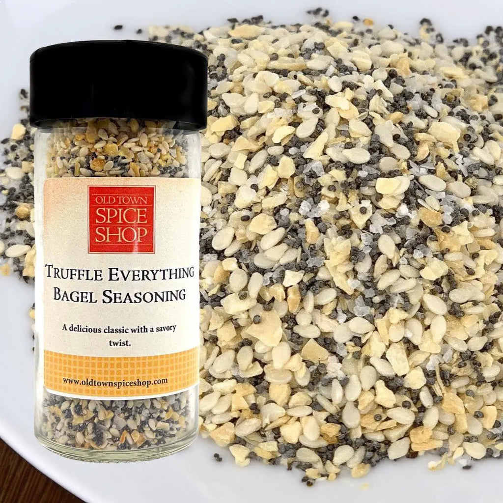Truffle Everything Bagel Seasoning from Old Town Spice Shop with a jar and seasoning mix on a white background.