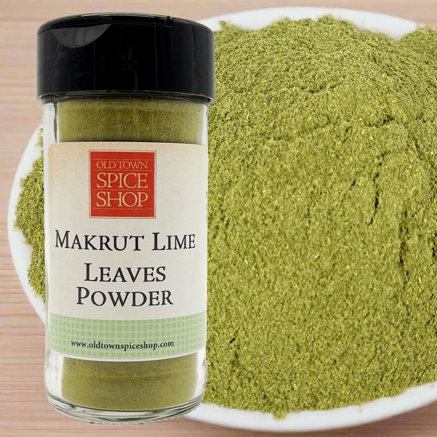 Makruth Lime Leaves Powder from Old Town Spice Shop with a jar and a bowl of powder on a wooden surface.