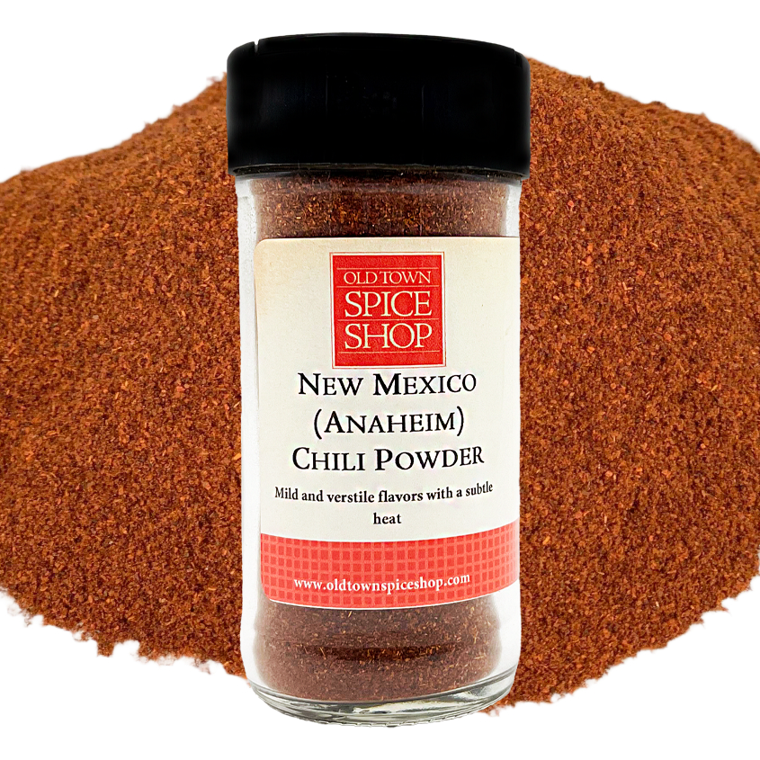 Jar of New Mexico Chili Powder from Old Town Spice Shop with chili powder on a white background