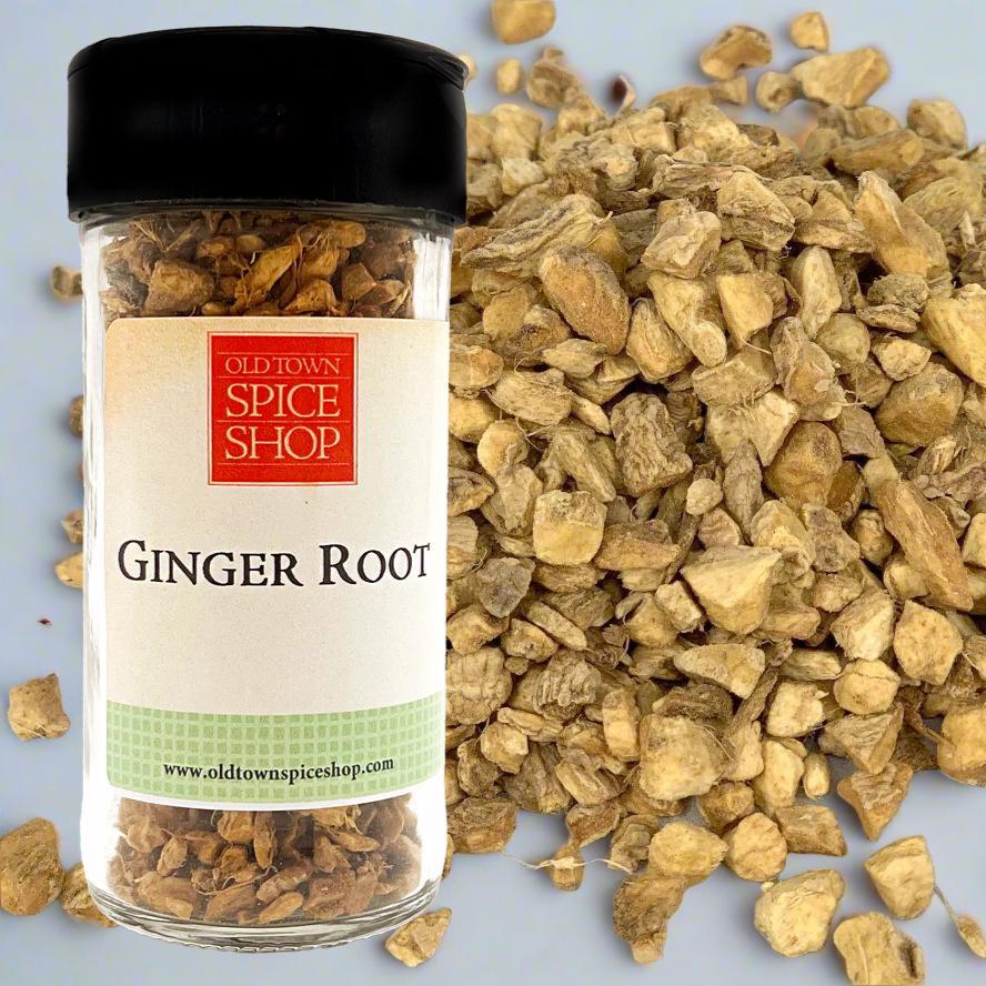 Jar of ginger root from Old Town Spice Shop with ginger pieces on a light blue background