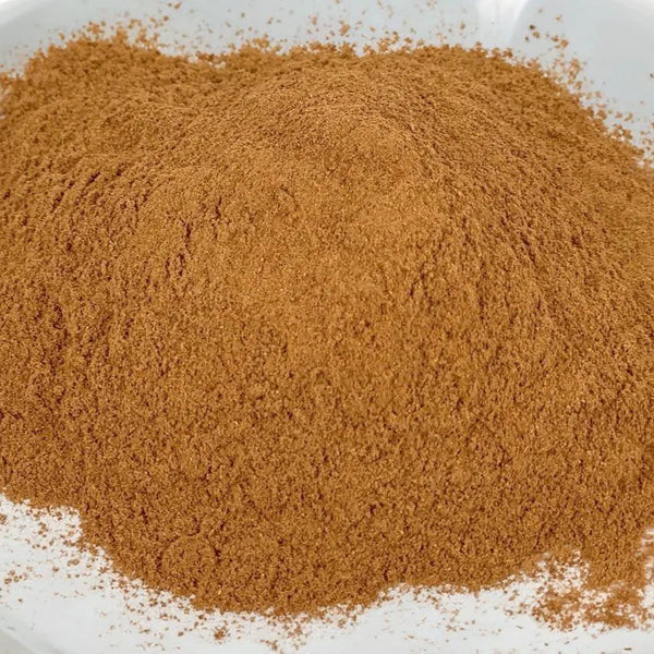 Close-up of brown powder on a white background