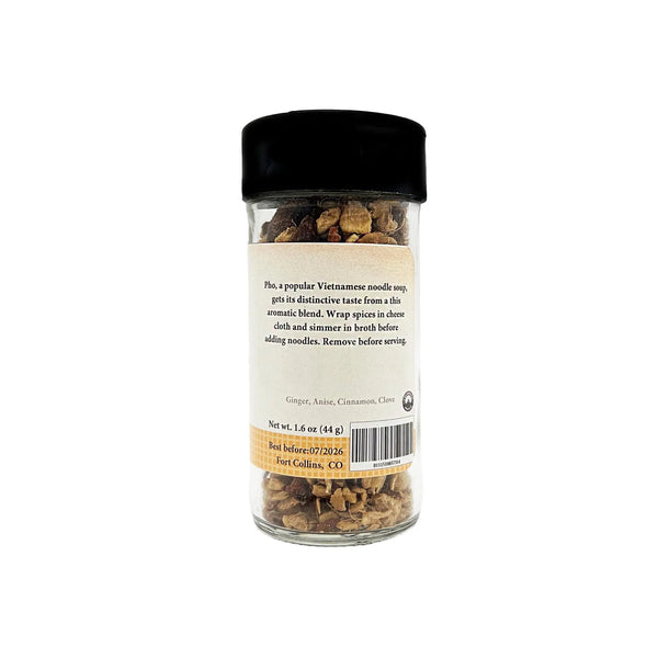 Spice jar with black lid and label on a white background