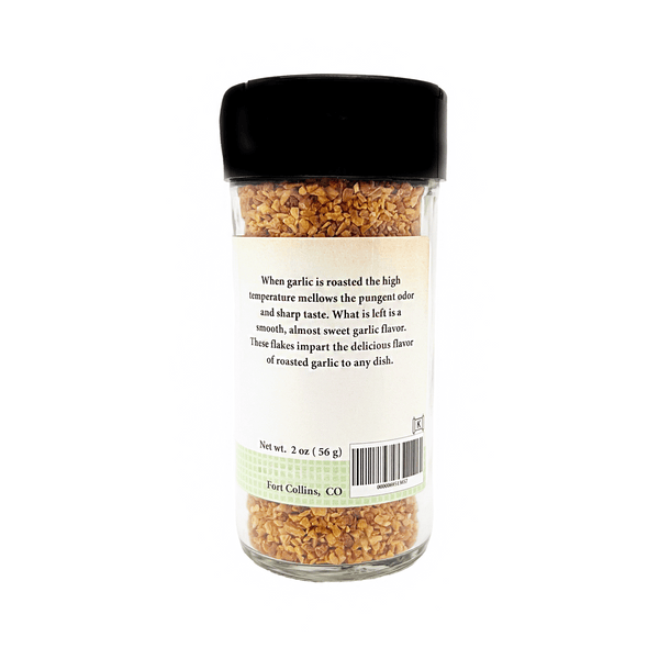 Spice jar with black lid and label on a white background