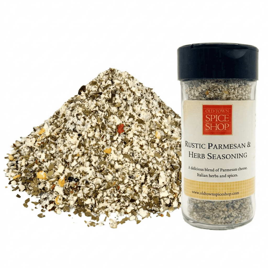 Bottle of Rustic Parmesan & Herb Seasoning from Old Town Spice Shop with spilled seasoning on a white background