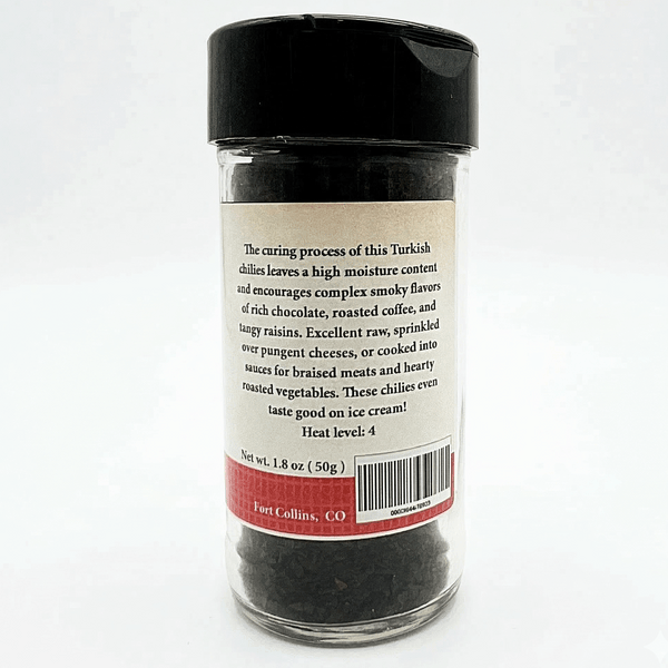 Spice jar with a label on a white background