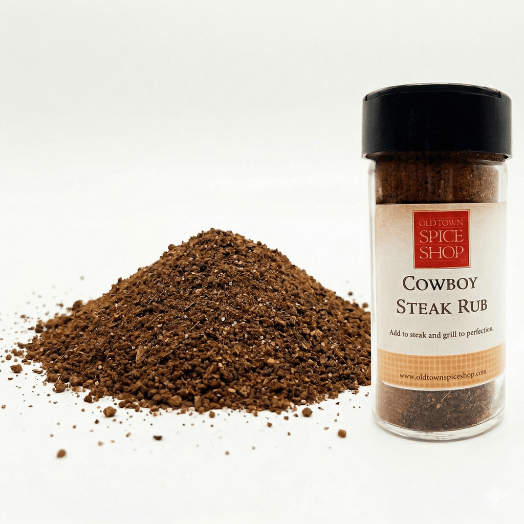 Cowboy Steak Rub from Old Town Spice Shop with a pile of ground spice on a white background