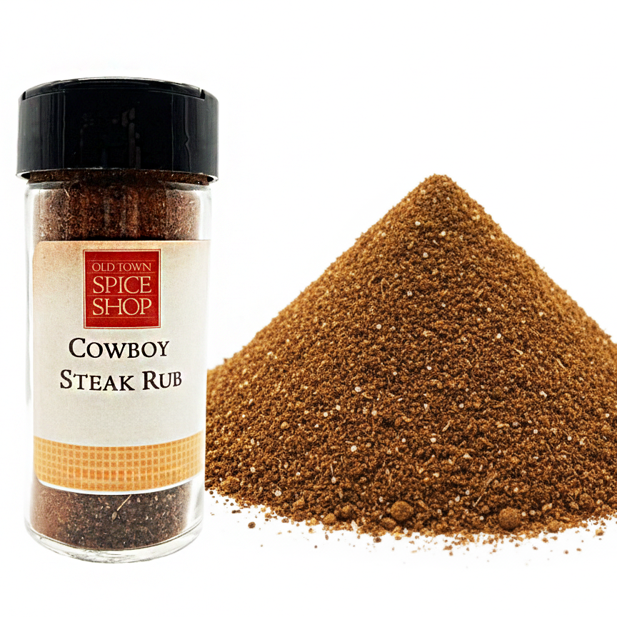Old Town Spice Shop Cowboy Steak Rub spice jar with a pile of rub on a white background