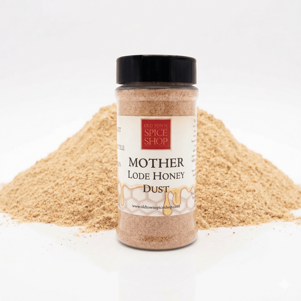 Jar of 'Mother Lode Honey Dust' from Old Town Spice Shop with honey dust around it on a white background