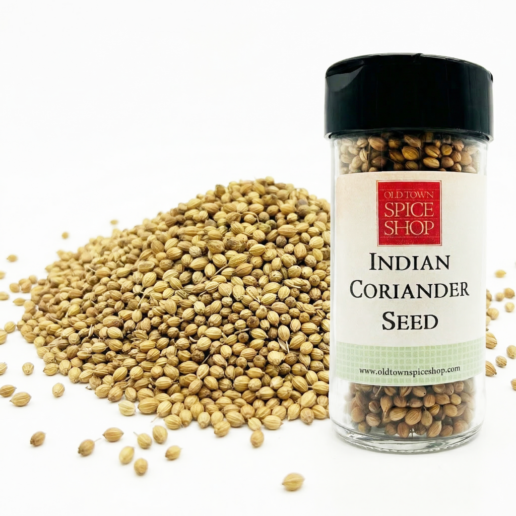 Jar of Indian Coriander Seed from Old Town Spice Shop with coriander seeds on a white background