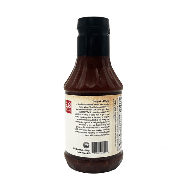 Bottle of Old Town Spice Shop BBQ sauce with label on a white background