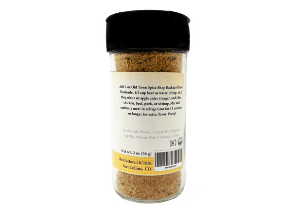 Spice jar with black lid and label on a white background