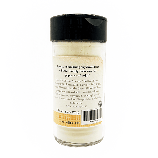 Glass seasoning container with black lid on a white background
