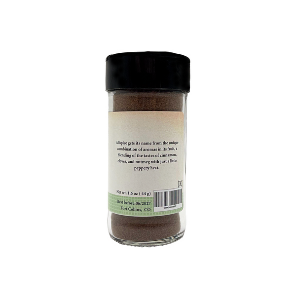 Spice jar with a black lid on a white background