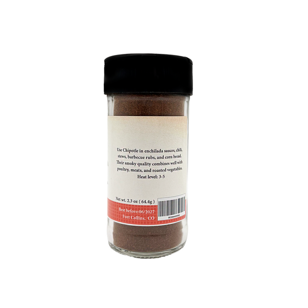 Spice jar with a black lid on a white background