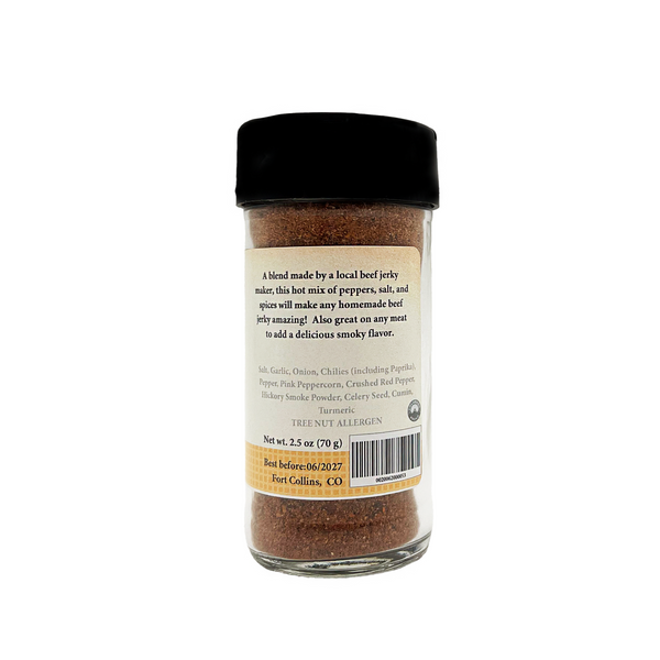 Spice jar with a black lid on a white background