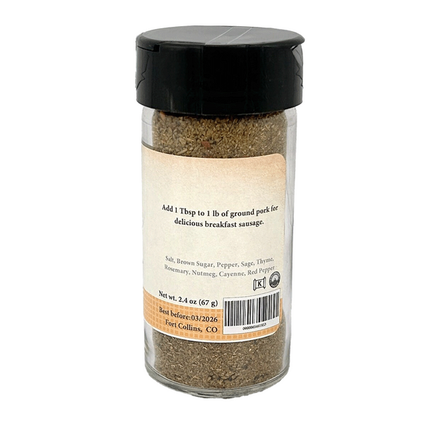 Spice jar with black lid on a white background