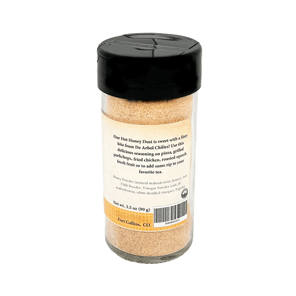 Spice jar with black lid and label on a white background
